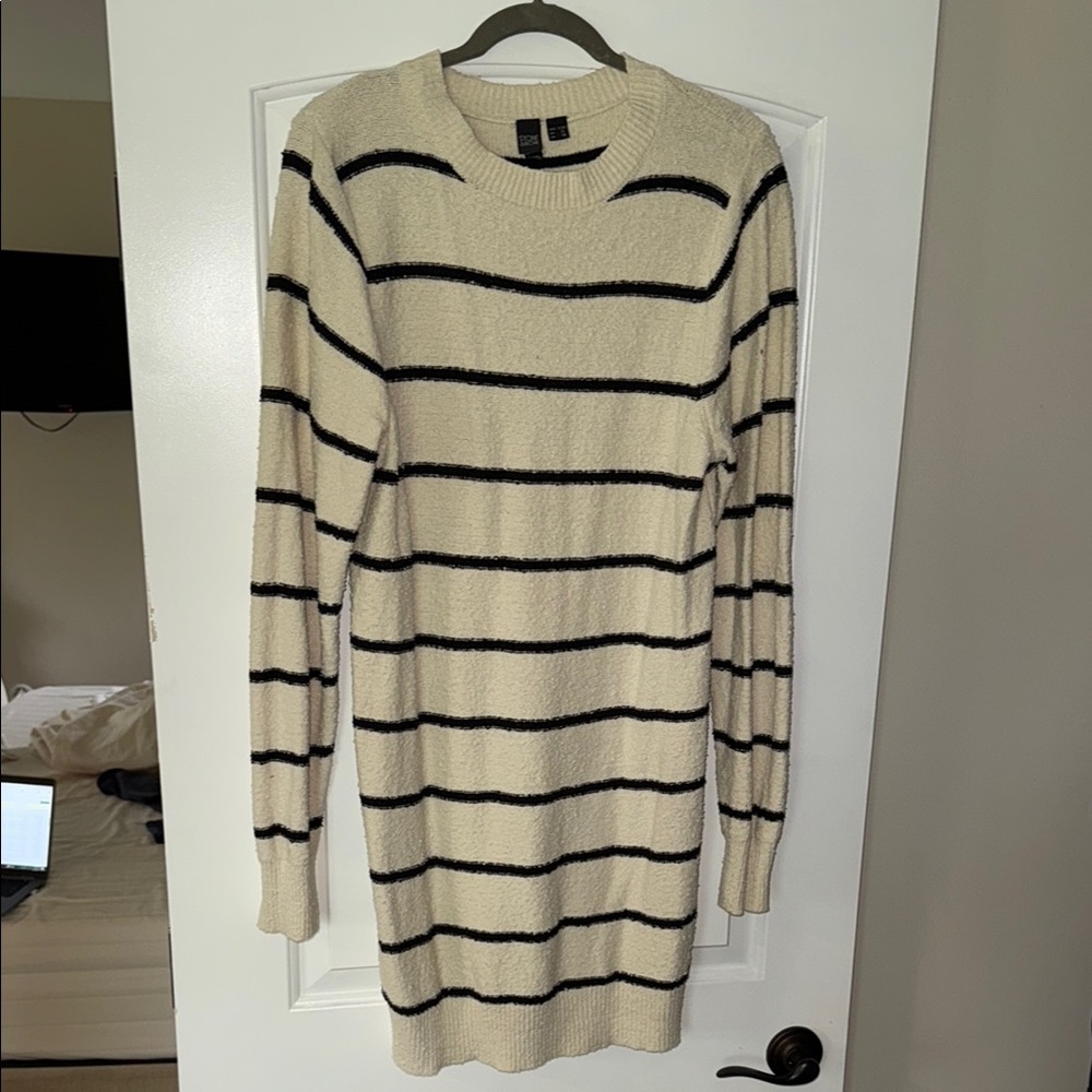 Woman’s Striped Cream and Black Sweater Dress